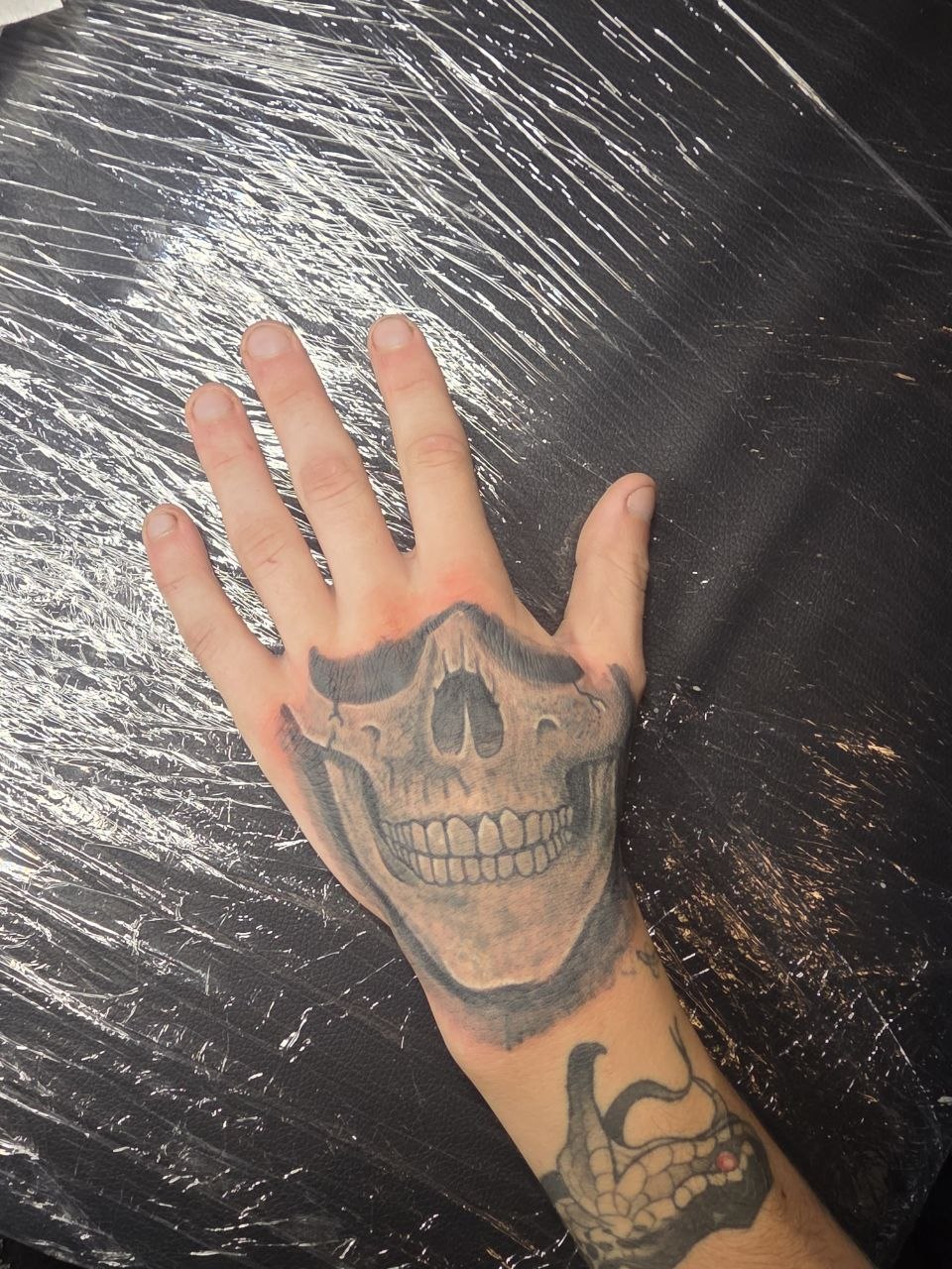 After: full grayscale skull cover-up